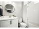 Classic bathroom with white vanity, bathtub, and shower at 1025 S Gilbert St # C, Castle Rock, CO 80104