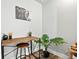 Small home office with rustic desk and leafy plant at 1025 S Gilbert St # C, Castle Rock, CO 80104