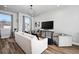 Living room with comfortable seating and large TV at 1025 S Gilbert St # C, Castle Rock, CO 80104
