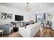 Living room with comfortable seating and large TV at 1025 S Gilbert St # C, Castle Rock, CO 80104