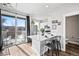 Modern kitchen with island and access to balcony at 1025 S Gilbert St # C, Castle Rock, CO 80104