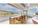 Indoor bar with mountain views and access to outside at 987 Lost Angel Rd, Boulder, CO 80302