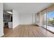 Living room with access to balcony and kitchen at 3100 E Cherry Creek S Dr # 307, Denver, CO 80209