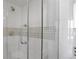 Modern shower with glass enclosure and stylish tile at 3100 E Cherry Creek S Dr # 307, Denver, CO 80209