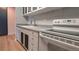 Modern kitchen with updated appliances and cabinetry at 3100 E Cherry Creek S Dr # 307, Denver, CO 80209