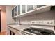 Modern kitchen with updated appliances and cabinetry at 3100 E Cherry Creek S Dr # 307, Denver, CO 80209