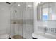 Updated bathroom with a glass shower and modern vanity at 3100 E Cherry Creek S Dr # 307, Denver, CO 80209