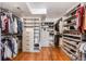 Spacious walk-in closet with ample shelving and hanging space at 4253 Navajo St, Denver, CO 80211