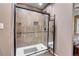 Large walk-in shower with updated tile work at 1736 S Pagosa Way, Aurora, CO 80017