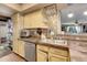 Well-equipped kitchen featuring ample cabinetry and a double sink at 1736 S Pagosa Way, Aurora, CO 80017