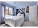 Bedroom with double bed, window, and closet at 1736 S Pagosa Way, Aurora, CO 80017