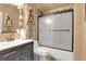 Bathroom with tub, shower, and updated vanity at 1736 S Pagosa Way, Aurora, CO 80017