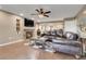 Bright living room with a fireplace and hardwood floors at 1736 S Pagosa Way, Aurora, CO 80017