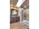 Updated bathroom with a walk-in shower and a vessel sink at 1736 S Pagosa Way, Aurora, CO 80017