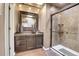 Bathroom with walk-in shower and modern vanity at 1736 S Pagosa Way, Aurora, CO 80017