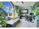 Sunlit office features a large window, plants and a desk area at 1736 S Pagosa Way, Aurora, CO 80017