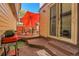 Private patio with seating area and umbrella at 1736 S Pagosa Way, Aurora, CO 80017