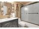Bathroom with tub, shower, and updated vanity at 1736 S Pagosa Way, Aurora, CO 80017