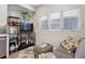 Open living area with sofa and media console at 2466 S Delaware St # 2, Denver, CO 80223