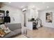 Home office with built-in desk and hardwood floors at 2466 S Delaware St # 2, Denver, CO 80223