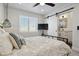 Main bedroom with ensuite bathroom and barn door entry at 2466 S Delaware St # 2, Denver, CO 80223