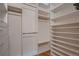 Large closet with double hanging rods and shelving at 1555 California St # 605, Denver, CO 80202