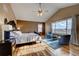 Main bedroom with hardwood floors and large windows at 22580 E Ridge Trail Dr, Aurora, CO 80016