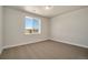 Simple bedroom with carpet and a window at 24113 E 36Th Pl, Aurora, CO 80019