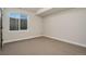 Basement bedroom with window and carpet at 24113 E 36Th Pl, Aurora, CO 80019