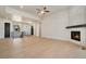 Spacious living room featuring hardwood floors, fireplace, and high ceilings at 24113 E 36Th Pl, Aurora, CO 80019
