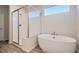 Bathroom with soaking tub and walk-in shower at 1251 Loraine N Cir, Lafayette, CO 80026