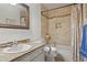 Updated bathroom with tub, shower, and grab bars at 2127 Helen Ct, Parker, CO 80138