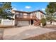 Two-story home with deck, garage, and landscaping at 2127 Helen Ct, Parker, CO 80138