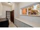 Laundry room featuring washer, dryer, folding counter, and storage at 1077 Carriage Hills Dr, Boulder, CO 80302