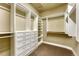 Large walk-in closet with ample shelving and drawers at 2949 Uinta St, Denver, CO 80238