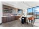 Community coffee bar with modern finishes and plenty of seating at 3893 Freestone Pt, Castle Rock, CO 80108