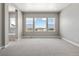 Bright bedroom with a view and plush carpet at 3893 Freestone Pt, Castle Rock, CO 80108