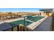 Community swimming pool with ample deck space at 3893 Freestone Pt, Castle Rock, CO 80108