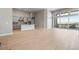 Open concept living area with kitchen, living room, and deck access at 3893 Freestone Pt, Castle Rock, CO 80108