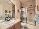 Clean bathroom with tub shower combo and updated vanity at 15501 E 112Th Ave # 30D, Commerce City, CO 80022