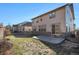 Two-story home with a fenced backyard and patio at 7844 S Elk St, Aurora, CO 80016