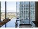 Modern kitchen with city views from the sink at 1133 14Th St # 1800, Denver, CO 80202