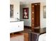 Hallway with hardwood floors, artwork, and built-in cabinetry at 1133 14Th St # 1800, Denver, CO 80202