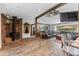 Living room with wood burning stove and open floor plan at 36725 Forest Trl, Elizabeth, CO 80107