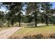 Long private driveway leading to the house at 36725 Forest Trl, Elizabeth, CO 80107