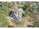 Aerial view showcasing the property's layout, including house, deck, and yard at 5519 Ponderosa Dr, Parker, CO 80134