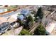 Aerial view showing house with solar panels, trampoline, and backyard at 1065 Modred St, Lafayette, CO 80026