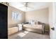 Cozy bedroom with a daybed and ceiling fan at 1065 Modred St, Lafayette, CO 80026