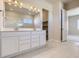 Double vanity bathroom with a large mirror and separate shower at 13873 Bunny Hop Ln, Parker, CO 80134