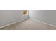 Empty bedroom with carpeted floor and window at 2225 Alyssa St, Fort Lupton, CO 80621